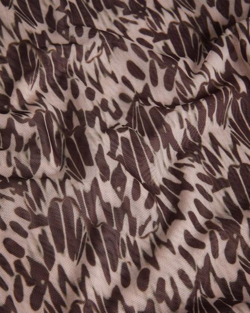 JUMILA-Tops-JUMILA is the ultimate in feminine style. Figure hugging fabric and our exclusive Wings print come together in this dainty top, which features a high neckline, long sleeves, and stretch fabric. This wardrobe staple can be can be worn with anything from tailored trousers to floaty skirts.The fabric of this product is made with 96% recycled polyester. Using recycled polyester helps divert plastic waste from ending in landfills and helps us to reduce our dependency on virgin materials. Fitted mesh